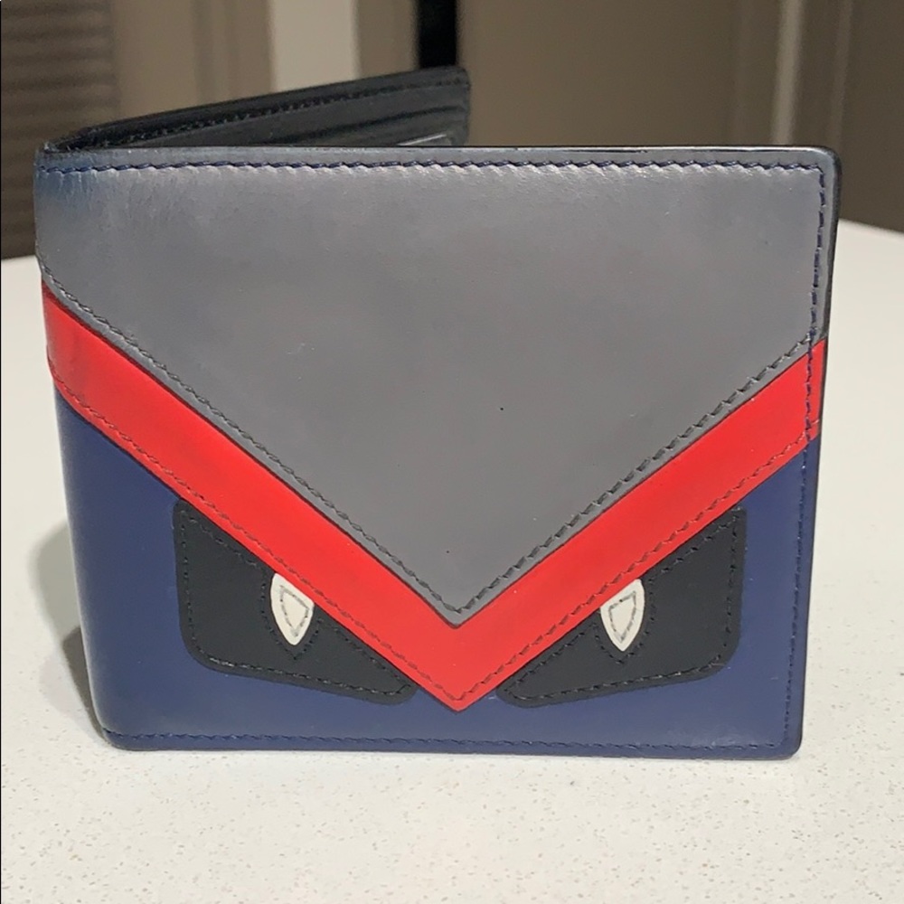 Fendi monster wallet used
